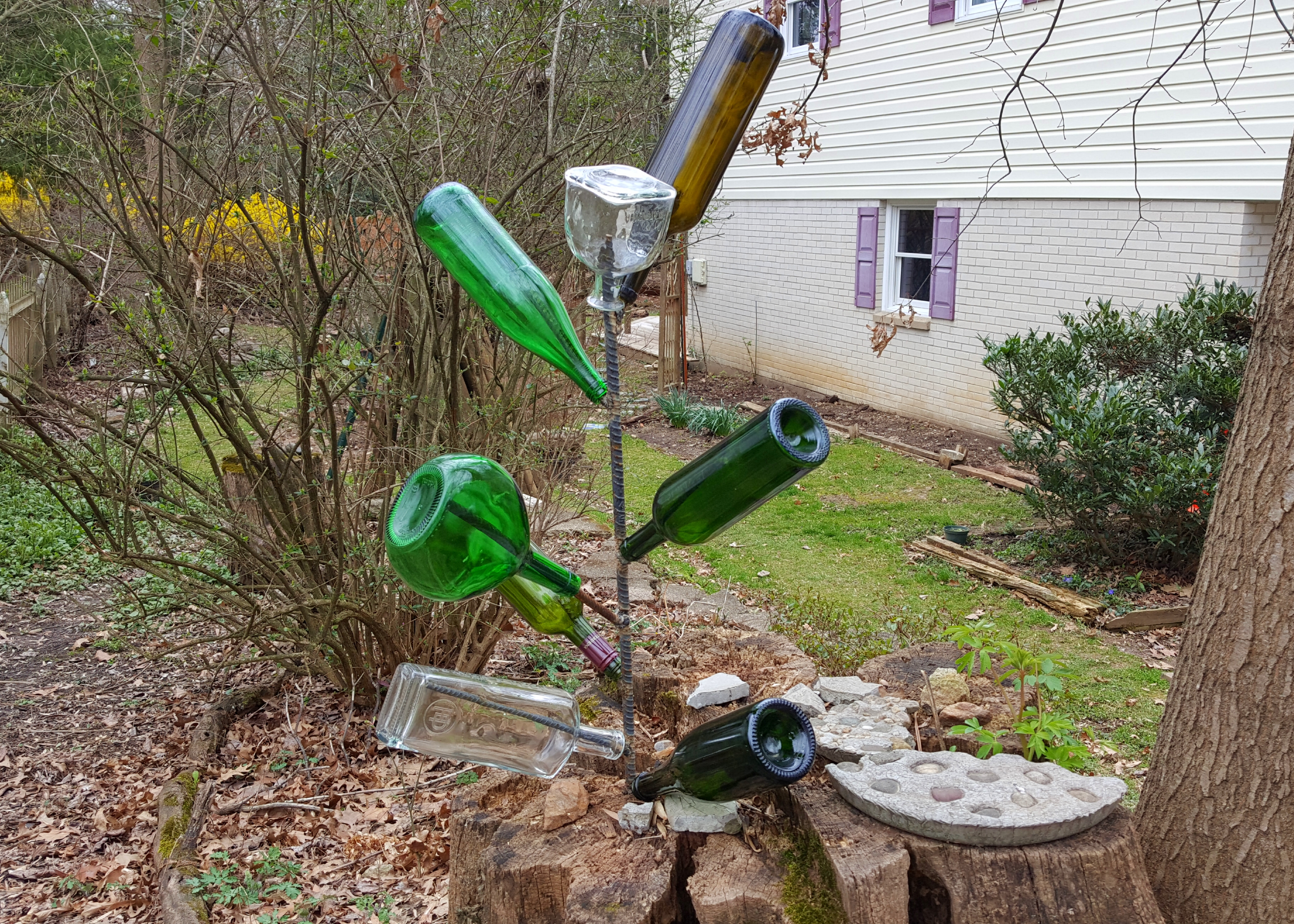 Welding project number one was a bottle tree. An older neighbor walking by commented that she really liked it. That made me feel a little better about trashing up the yard. Lol. Photo and bottle tree by Dragonfly Leathrum